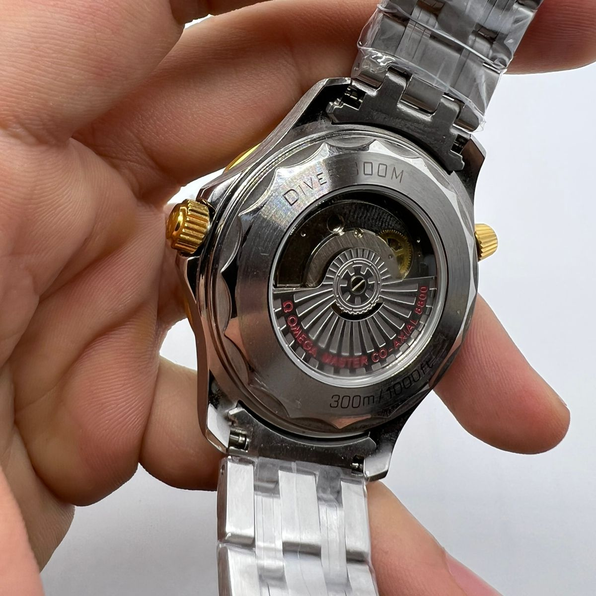 Relógio Omega Seamaster Diver 300M Fundo Preto com Dourado